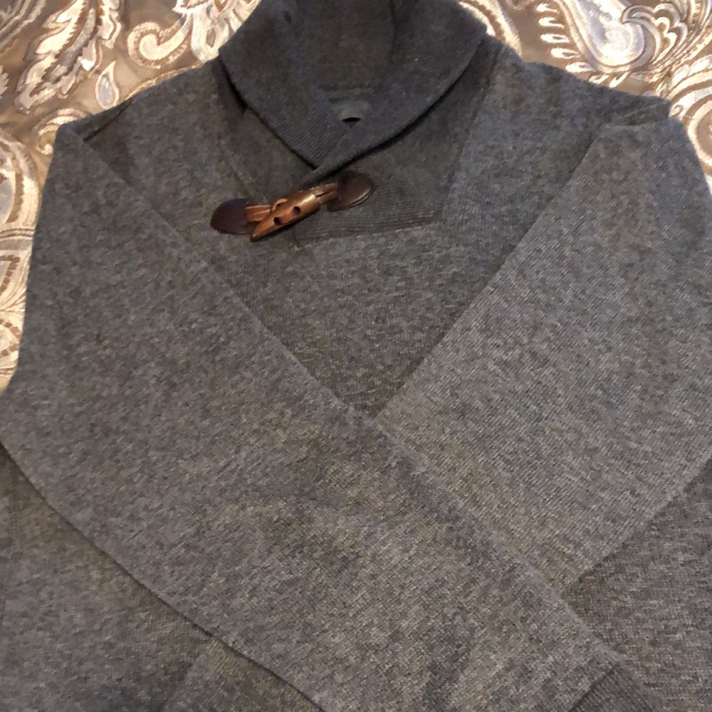 Men’s grey long sleeve pullover by Onossis LLC
